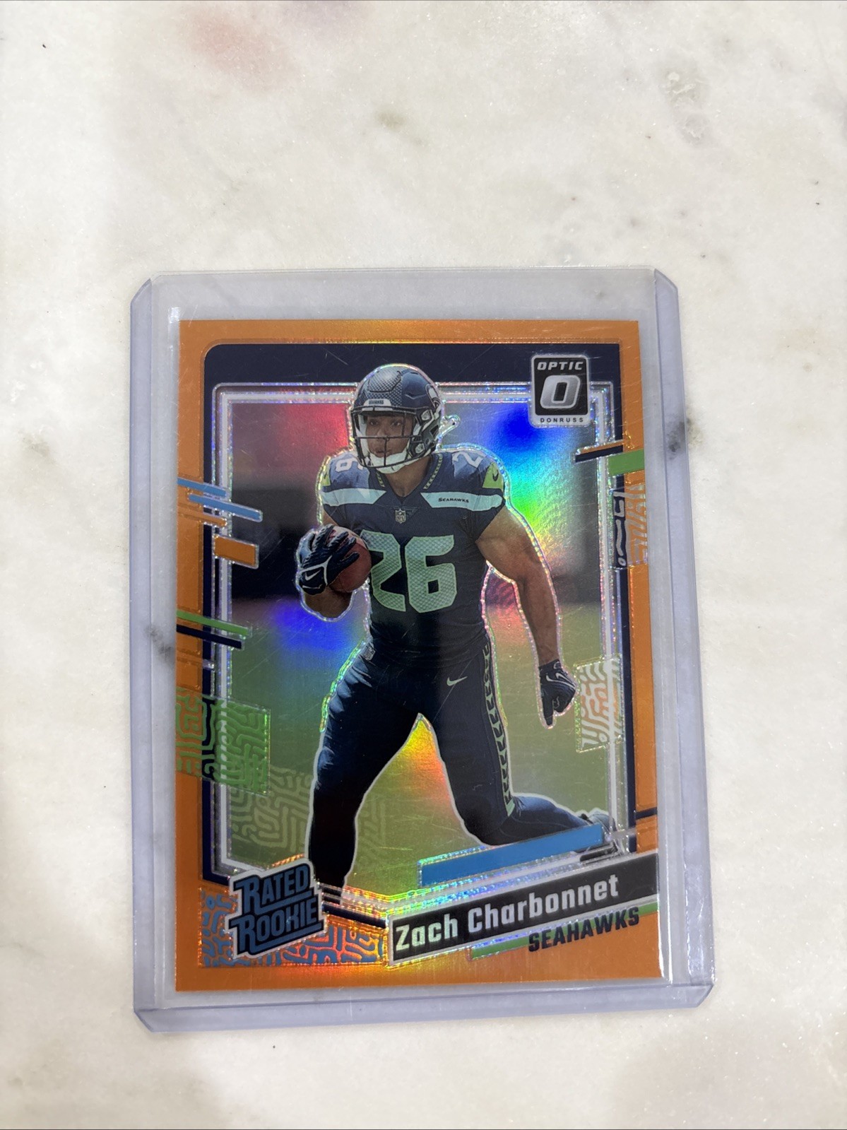 2023 Panini Donruss Optic Zach Charbonnet #294 167/249 Prizm Orange Rated Rookie