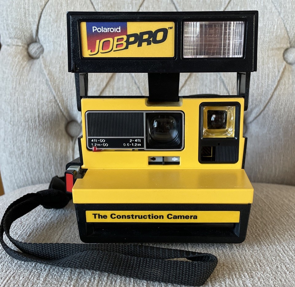 The Polaroid JobPro was a rugged, yellow-and-black construction-site instant camera — a genuinely rare and visually distinct model most people have never seen.