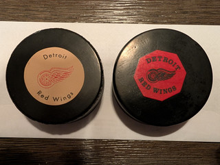 vintage Red wings hockey pucks