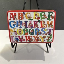 Vintage alphabet magnets with Tin