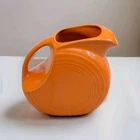 Homer Laughlin Fiestaware Disc Pitcher in  Tangerine