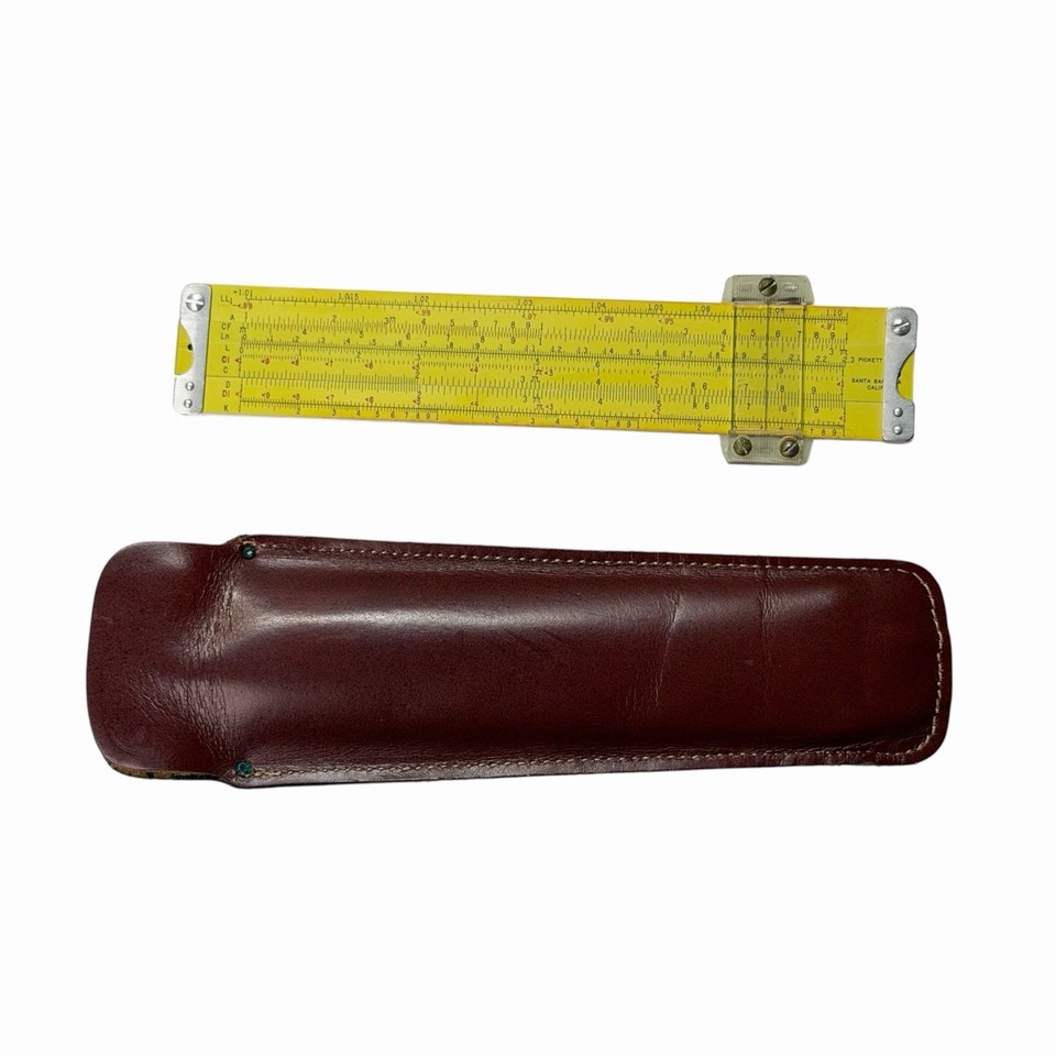 A USA-made Pickett N600-ES Log Log Synchro-Scale slide rule with leather case — the premium aluminum slide rule NASA engineers actually used.