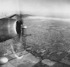 The propeller an unspecified aircraft obscures left hand side aeria- 1949 Photo