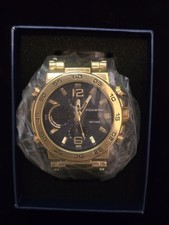 RELOJ FOX BOX PARA HOMBRE ESTILO BUZO TONO DORADO, CORREA NEGRA, NUEVO EN CAJA CON PAPELES