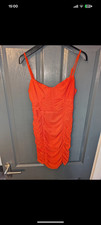 orange ruched mini dress for woman