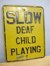 Vintage Embossed Slow Deaf Child Playing Metal Sign 18 x 24
