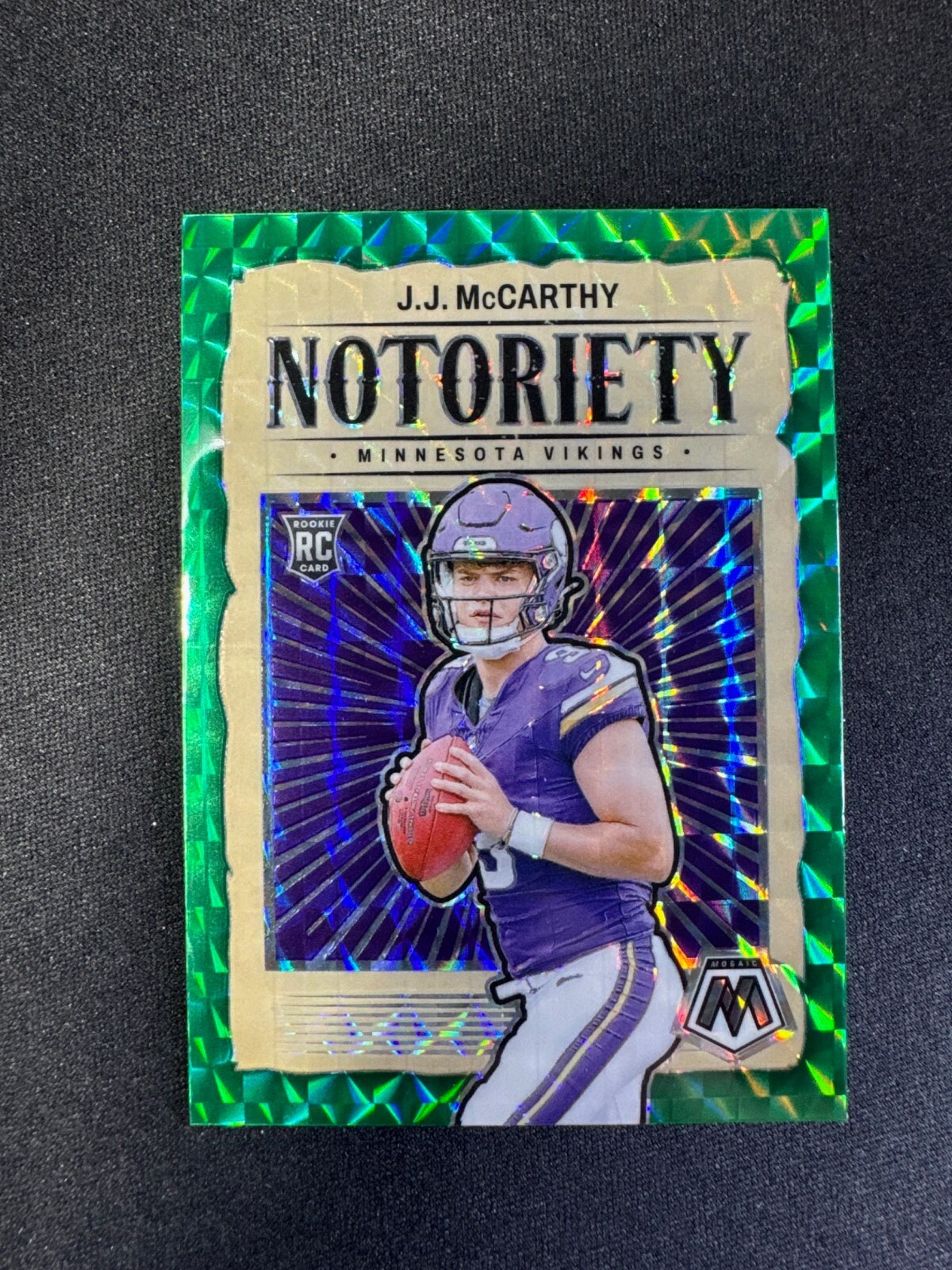 2024 Panini Mosaic J.J. McCarthy RC Notoriety Green Prizm #21 Rookie Vikings