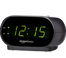 Amazon Basics Small Digital Oval Alarm Clock: LED Display, Nightlight & Battery