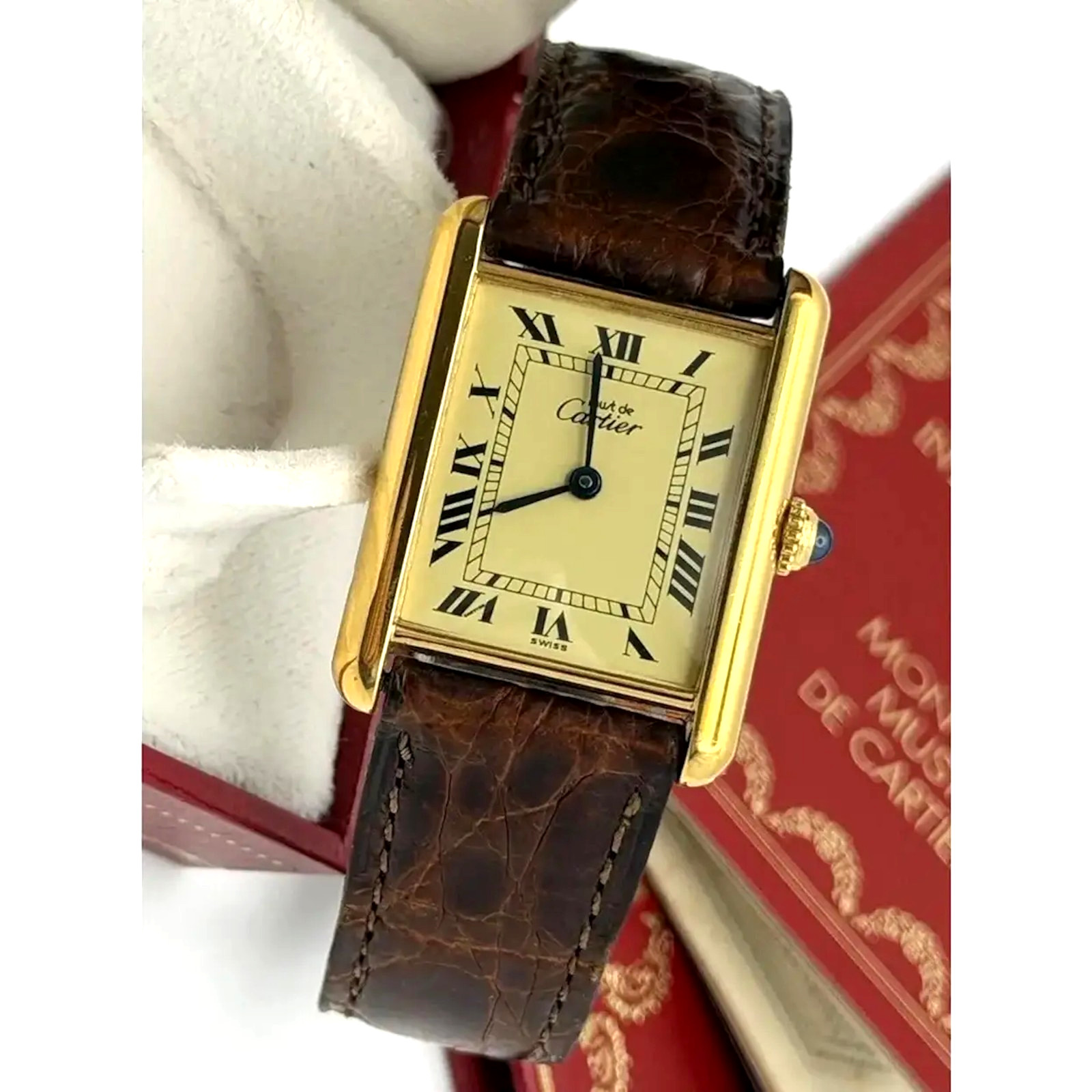 Must De Cartier Tank Watch is a Luxury classic watch featuring a Gold Vermeil
