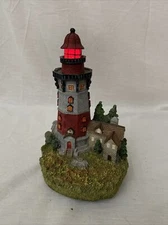 Santa's workbench collection Stoneybrook Brook lighthouse With The Music Box