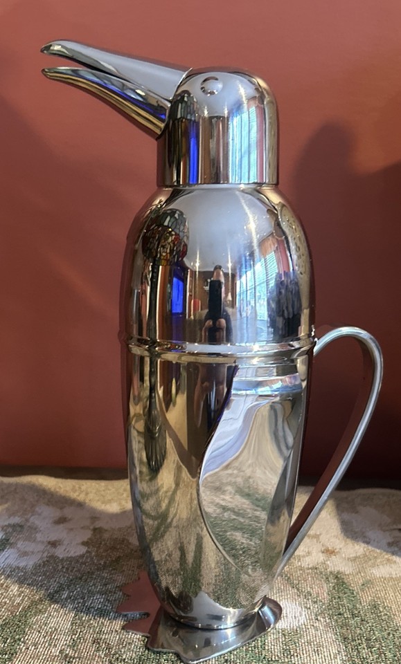 A penguin-shaped polished chrome cocktail shaker — the most charming Mid-Century Modern bar accessory ever made, and this one's new-old-stock.