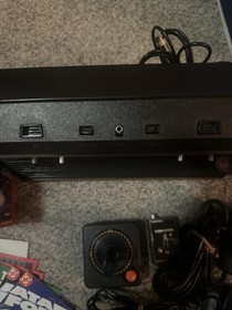 Atari 2600 Console Bundle Joysticks Paddles 7 Games Manuals and More