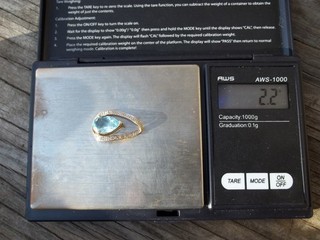 2.2 Grams 10K Karat Gold Pendant with Blue Stone Acid Tested FREE