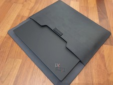 14" Full grain black leather outer with felt lined inner X1 Carbon Folio Case