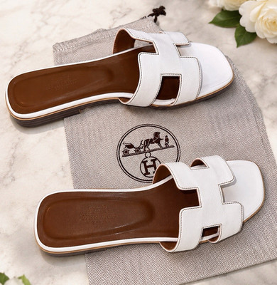 Hermès Women s White Leather Slip-On Slide Sandals Logo Accent EU 37 US 7