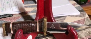 Monty Miller Custom Fixed Blade Hunting Knife Stacked Leather Brass Paw Print. 