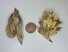Two Vintage Gold tone Brooches One Unmarked, One By Trifari  