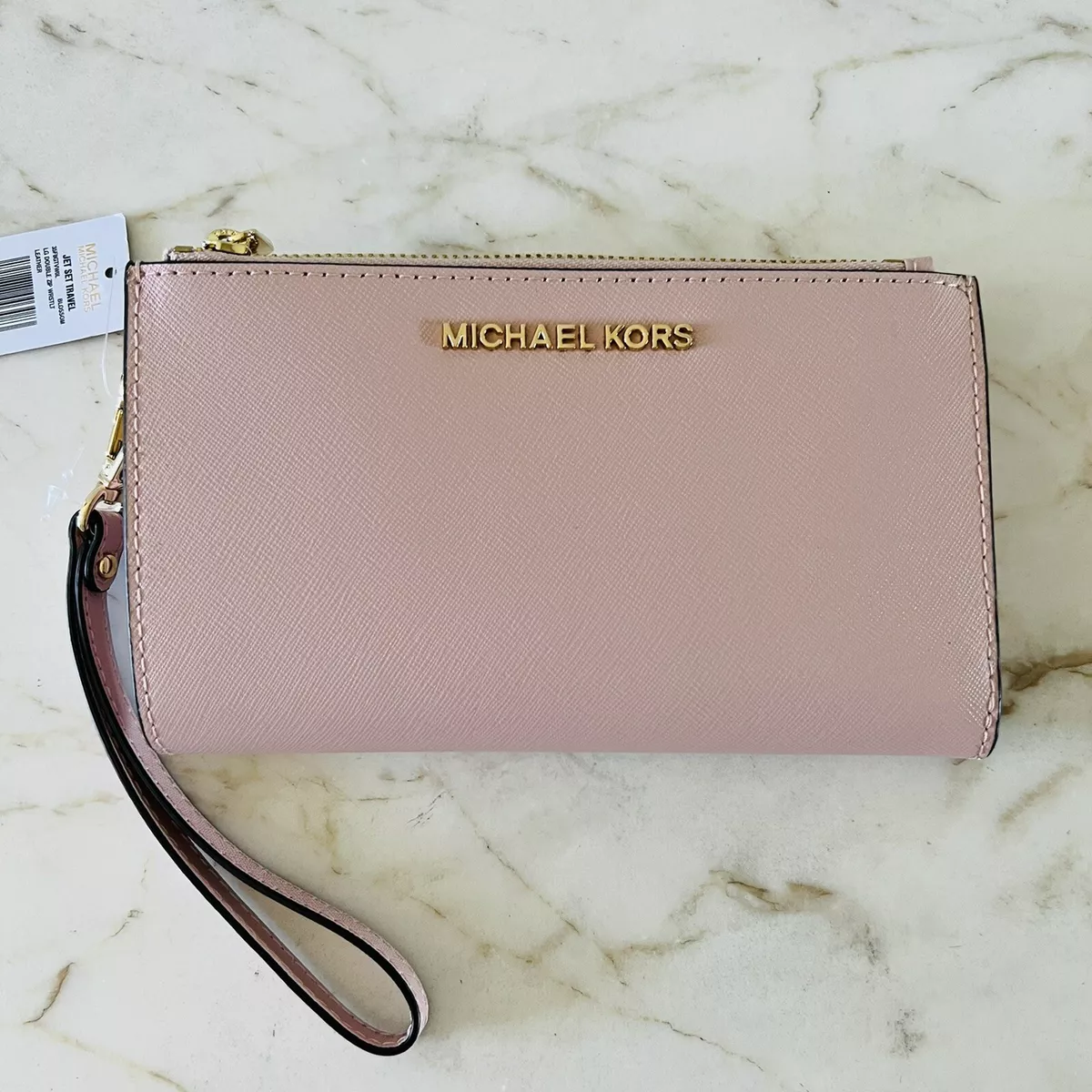 Michael kors 2025 pale pink wallet