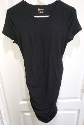 juniors size 7-9 SOLID BLACK DRESS GATHERED ON BOTTOM SIDES FORM FITTING NICE!