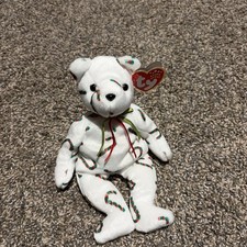 Ty Beanie Baby: "Cand-e" The Bear. DOB:12-13-2001