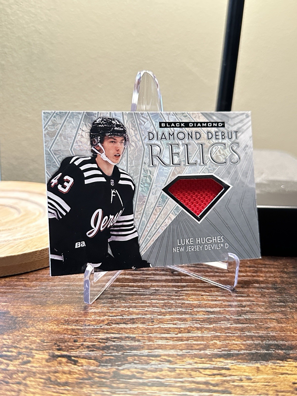 Luke Hughes #DD-LH Hockey Cards 2023 Upper Deck Black Diamond Debut Relic trading card — raw and PSA graded price guide