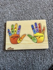 Melissa  Doug Hand Peg Wooden Puzzles