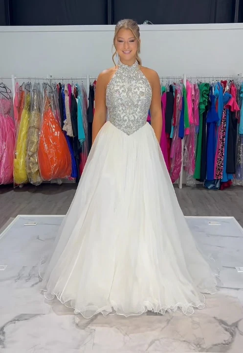 Vestidos de novia de lujo con cuello alto sin espalda línea A sin mangas con cuentas Foto 3 de 4