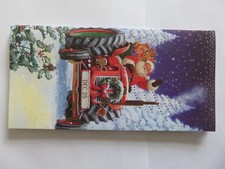 Christmas card.  Santer waving from a red tractor packed with presents