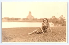 Postcard RPPC Real Photo Woman on Lawn, State Capitol? Building in Distance