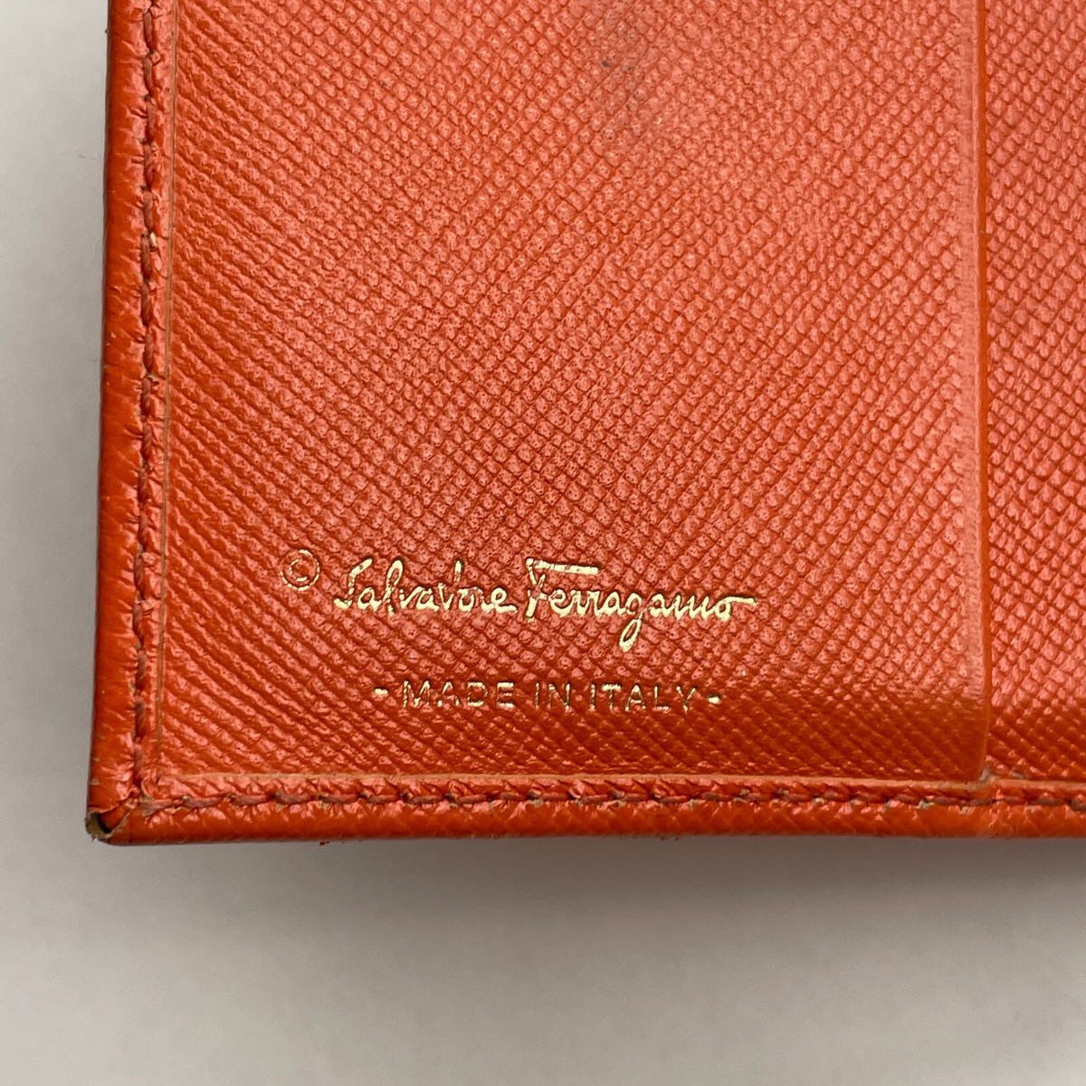 Authentic Salvatore Ferragamo Gancini Bifold Wallet Orange