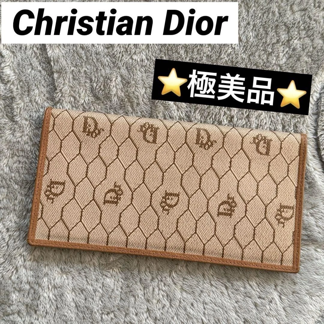 Portefeuille long Dior motif nid d'abeille double pli PVC état cuir
