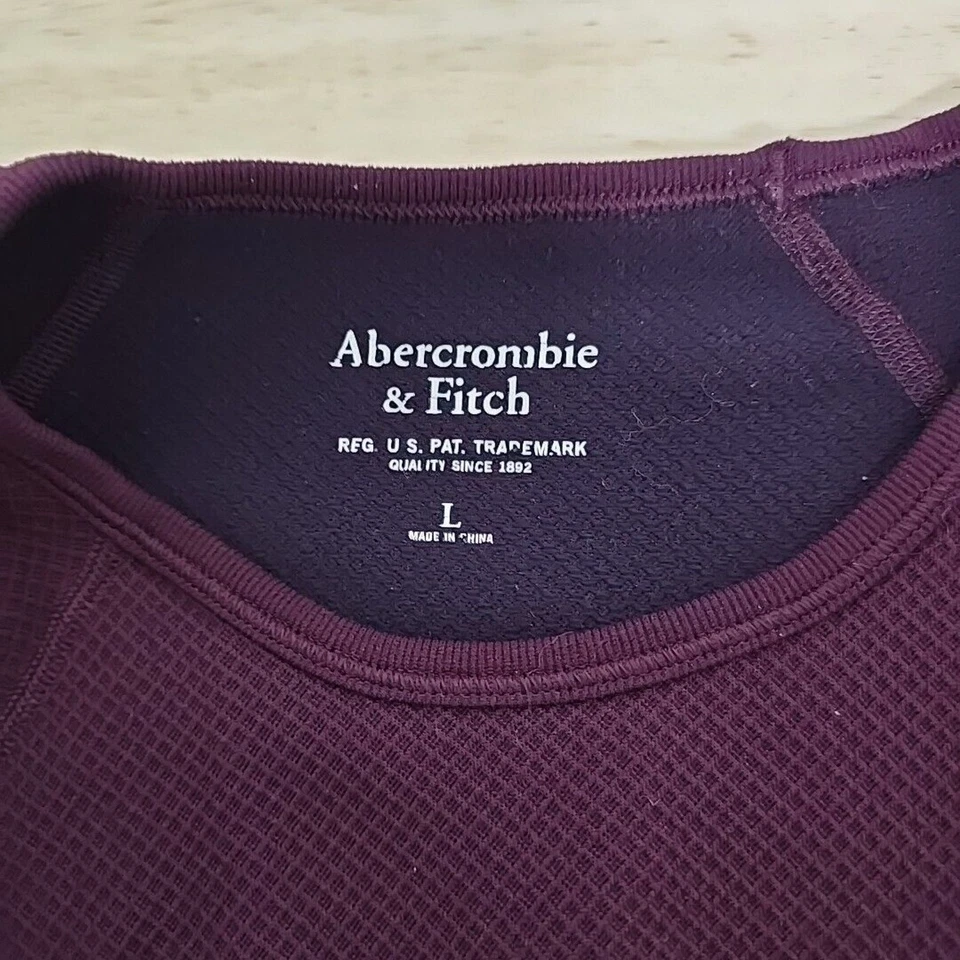 Prenda deportiva sin costuras manga larga Abercrombie & Fitch talla grande logotipo deletreado Foto 3 de 4