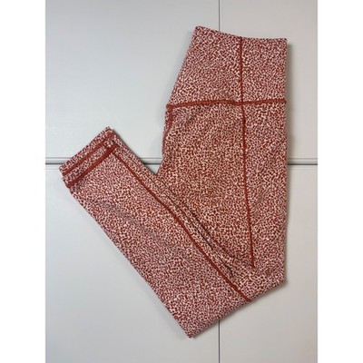 Athleta Salutation Stash II Textured Tight Rust Orange White Animal Print Small