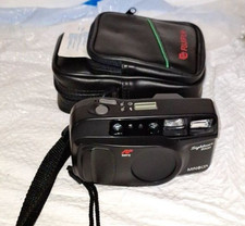 A Minolta Sightseer Zoom 35MM Camera With Case Built in Flash Point and Shoot