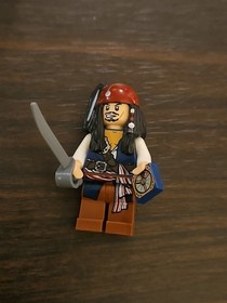 LEGO 4184 Pirates of The Caribbean Jack Sparrow Minifigure W/ Accessories GUC 
