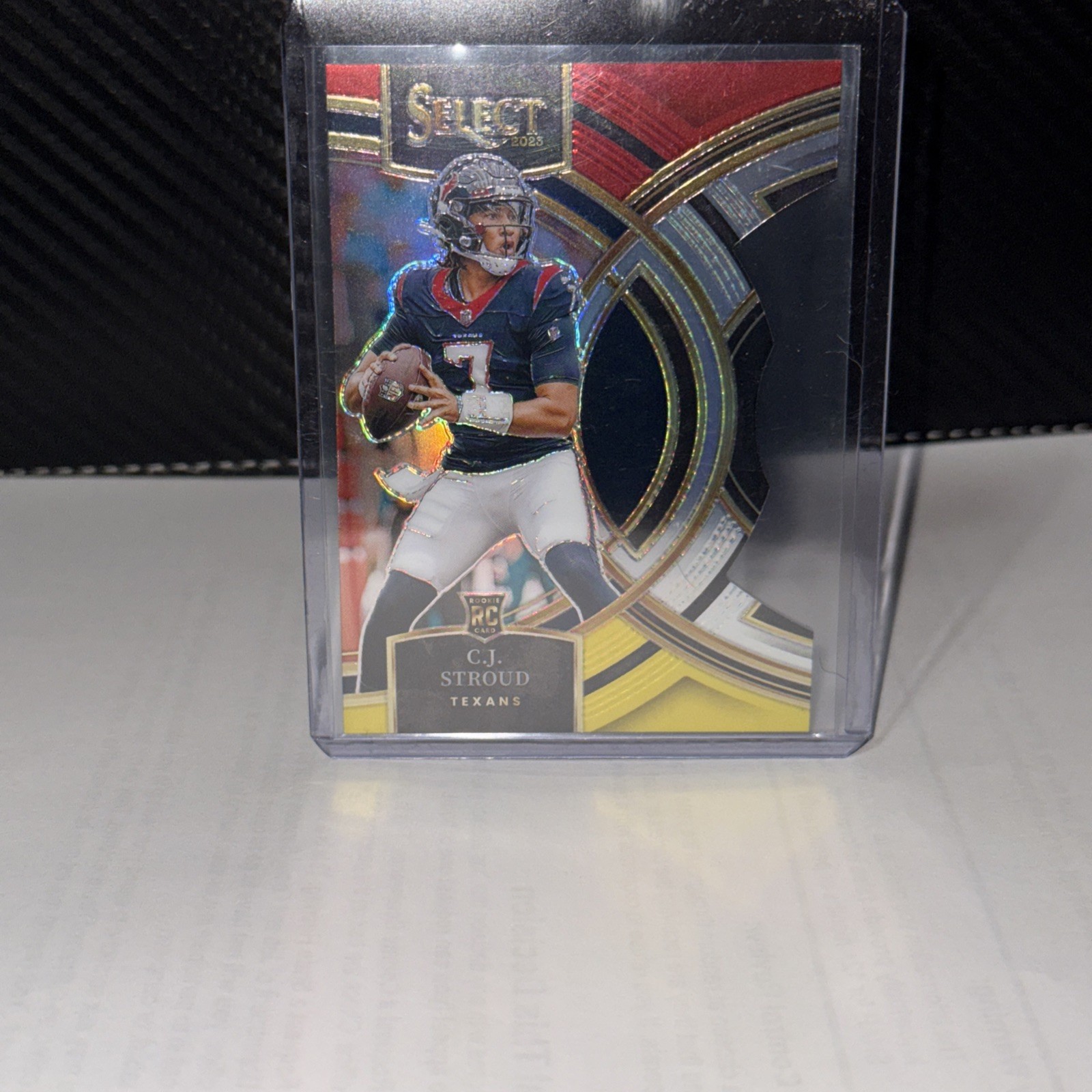 2023 Select C.J. Stroud Premier Level Red Yellow Prizm Die-Cut RC #183