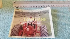 AC0009 Allis-Chalmers Photograph, MEDIA ARCHIVE MAN ON TRACTOR NO CAB IN FIELD