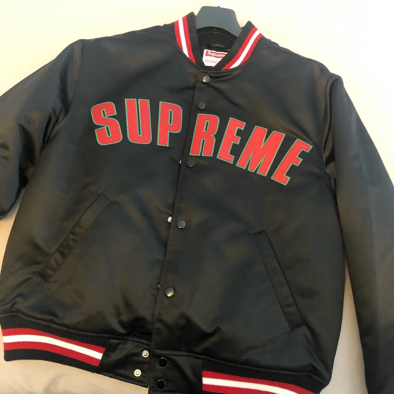 Veste universitaire noire Supreme Mitchell and Ness moyenne