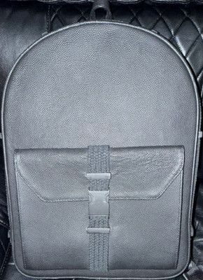 Black pebbled faux-leather buckle backpack by A|X Armani Exchange