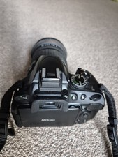 Nikon D5100 DSLR Camera + Sigma 17–50mm f/2.8 Lens