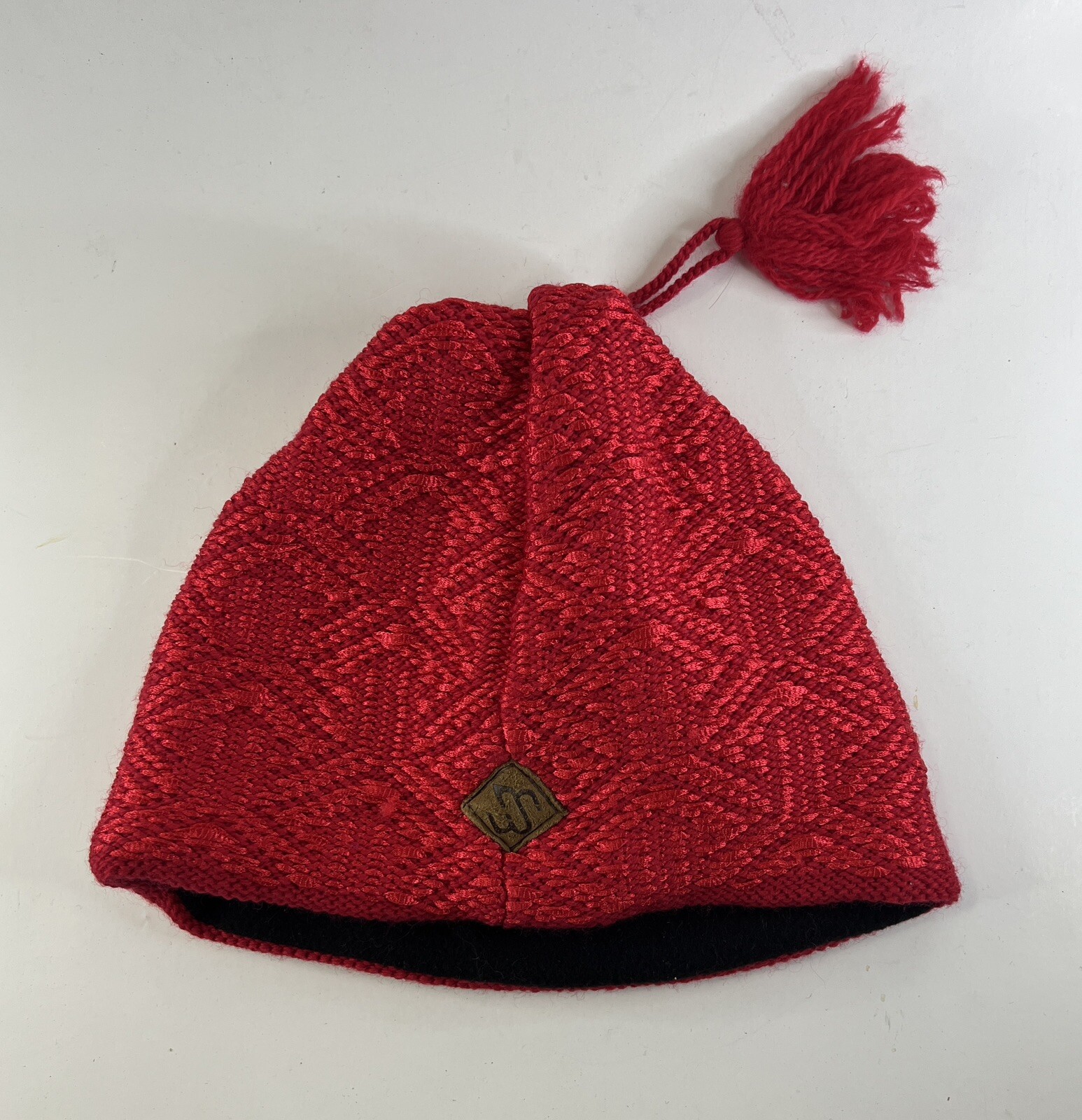 Merkley Headgear Red Fleece Beanie Hat Tassel Vail USA Toronto Canada