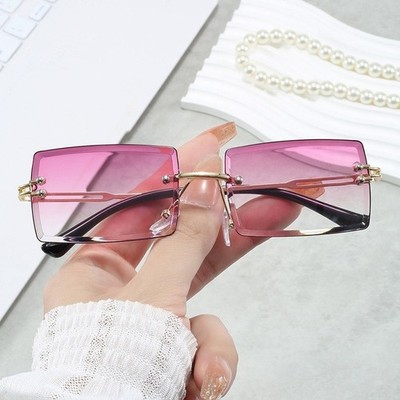 Trendige UV 380 geschützte rahmenlose quadratische Sonnenbrille für modische Anwender