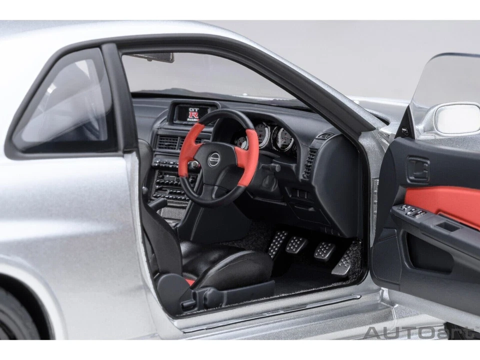 COCHE MODELO NISSAN NISMO R34 GT-R Z-TUNE RHD PLATEADO 1/18 AUTOART 77461 Foto 4 de 4