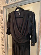 White House Black Market Black Long Sleeve Jumpsuit w/ metallic detail at sleeve