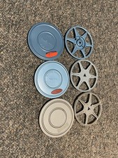 Three 200 feet Regular 8 metal movie reels with cans.