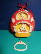 "SANKYO" carillon vintage "Casa con conigli", plastica rigida, 1979, h. 16 cm.