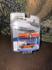 Greenlight Chase 2012 Red Chevrolet Corvette Z06 Green Machine 1:64 scale
