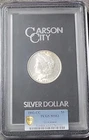1882- CC  MS63 GSA MORGAN DOLLAR IN LARGE PCGS GOLD SHIELD HOLDER