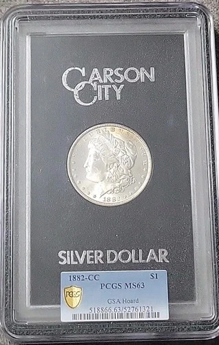 1882- CC  MS63 GSA MORGAN DOLLAR IN LARGE PCGS GOLD SHIELD HOLDER