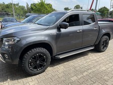 RID R01 9x18 6x114,3 Felgen + Reifen BF KO2 265/60/18 für Navara X350 Alaskan